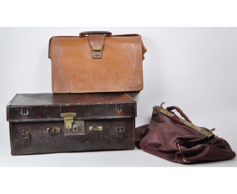 Three 20th century leather bags, including a Gladstone leather satchel, a Fisher trunk / briefcase, with H.A.M initials to th