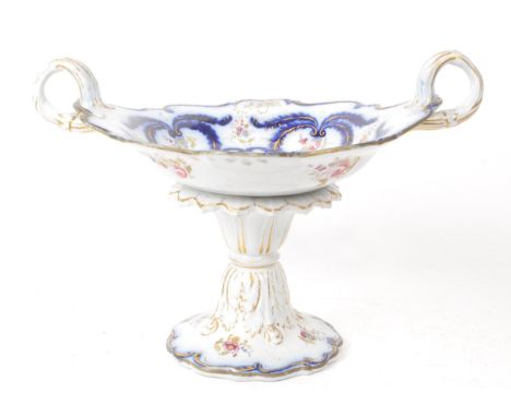 An early 20th-century ceramic tazza / sweet dish, decorated with hand-painted blue and pink floral detailing and gilt highlig