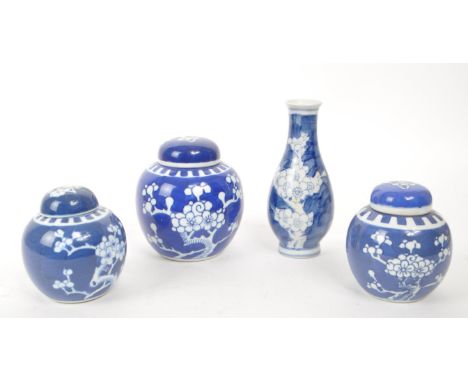 Collection of vintage 20th century Chinese prunus ginger jars and vase. Traditional blue and white design with double ring ma