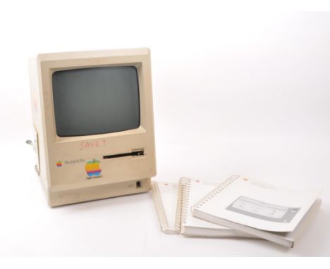 Apple - A vintage late 20th century 1980s Apple Macintosh Plus personal computer. The computer in white colourway. With origi
