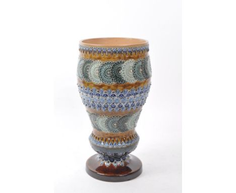 Royal Doulton Lambeth - A late 19th century ceramic pottery vase / planter. Brown ground with blue repeating pattern floral a