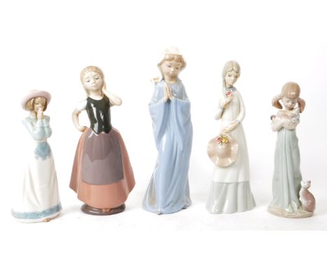 Lladro - Nao - Collection of five late 20th-century Spanish porcelain figures, including examples such as a Nao 1982 A-23N fa