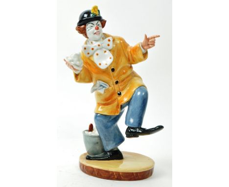 Royal Doulton - A vintage 1970s porcelain 'The Clown' figurine no. HN 2890, with a glazed finish. Hand-painted, with a brown 