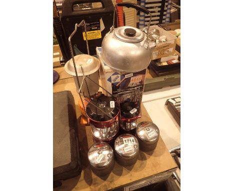 Four Mixed camping lights with 3 unused canisters; pair of Gelert LED battery operated lights; blue Lumogaz C200 camping gas 
