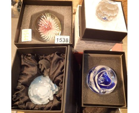 Four boxed large colourful and patterned paperweights and one smaller. P&amp;P Group 2 (£18+VAT for the first lot and £3+VAT 