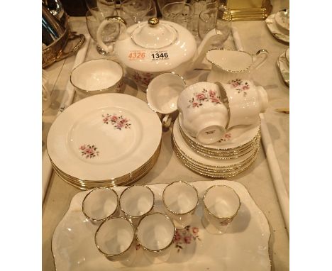 Floral decorated part tea service of 28 pieces including teapot. Not available for in-house P&amp;P, contact Paul O'Hea at Ma