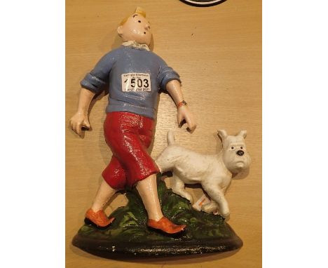 Cast iron Tin Tin and dog doorstop, H: 33 cm. P&amp;P Group 2 (£18+VAT for the first lot and £3+VAT for subsequent lots) 