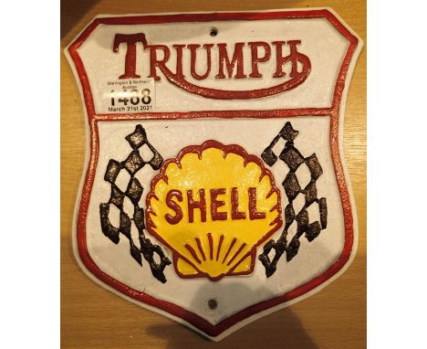 Cast iron Shell Triumph sign, L: 20 cm. P&amp;P Group 1 (£14+VAT for the first lot and £1+VAT for subsequent lots) 