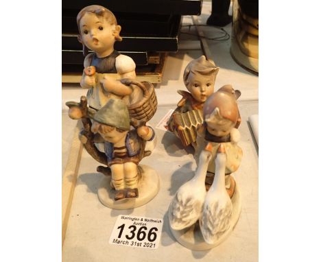 Four Goebel character figurines. P&amp;P Group 2 (£18+VAT for the first lot and £3+VAT for subsequent lots) 
