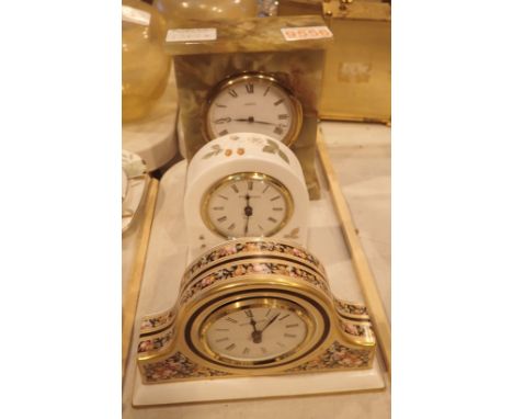 Two small Wedgwood ceramic cased and floral patterned clocks and a larger Angelus clock. Not available for in-house P&amp;P, 