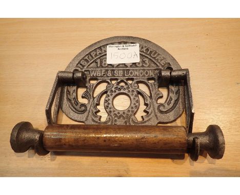 Cast iron St Pancras toilet roll holder. P&amp;P Group 2 (£18+VAT for the first lot and £3+VAT for subsequent lots)