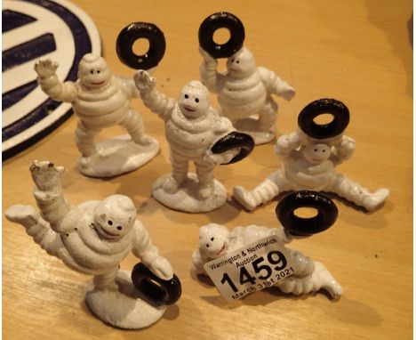 Six cast iron Michelin figurines. P&amp;P Group 2 (£18+VAT for the first lot and £3+VAT for subsequent lots) 