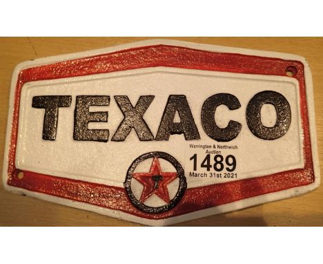 Cast iron white and red Texaco sign, L: 22 cm. P&amp;P Group 1 (£14+VAT for the first lot and £1+VAT for subsequent lots) 
