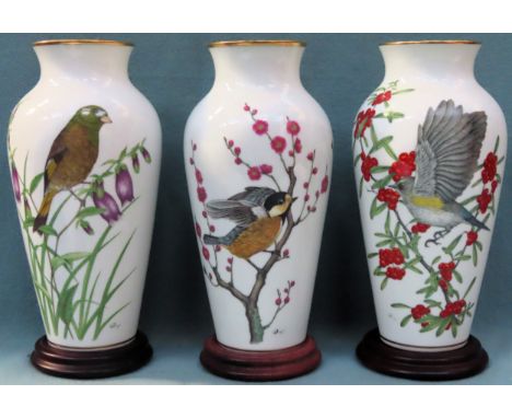 Three Japanese 'Ryu Okazaki' for Franklin Porcelain Limited Edition ceramic vases on wooden stands. Approx. 33cms H

all reas