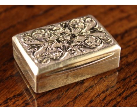 A Georgian Silver Gilt Snuff Box hallmarked London 1780, with Charles Rawlings maker's punch. The rectangular lid chiseled an