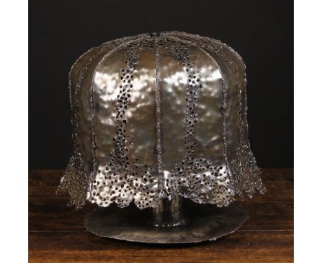 An Unusual Bronzed Sheet Metal 'Art'  Lamp. The cloche shade composed of eight welded panels pierced with decorative perforat