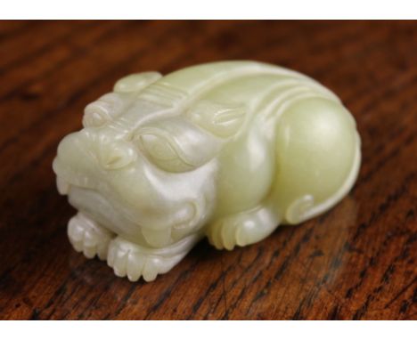 A 19th Century Celadon Jade Carving of a Mythical Beast, 23/8 ins (6 cms) in length, 11/8 ins (3 cms) high, 1½ ins (4 cms) wi