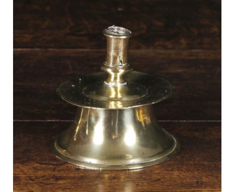 A 16th Century Capstan Candlestick, 4½ ins (11.5 cms) high.* 
