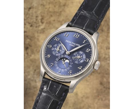 Patek Philippe. A fine and rare 18K white gold automatic perpetual calendar wristwatch with moon phaseReference: 5327G-001Dat