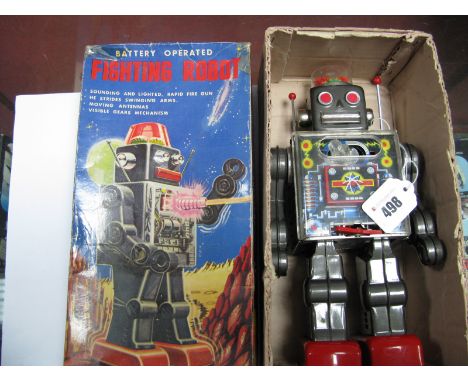 A 1960's Tinplate 'Fighting Robot' By S.H. of Japan. Appears complete. Slight corrosion to battery box area, otherwise good. 