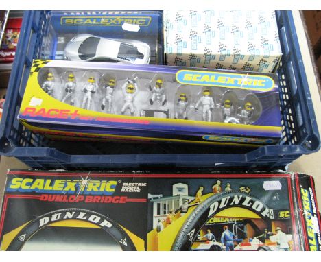 Five Boxed Scalextric Items, including Mclaren MP4-12C, pit team silver with yellow helmets, pit team blue with white helmets