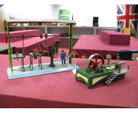 A Toy Shop Model of a Steam Driven Workshop, comprising line shaft with accessories of a circular saw, grinding wheel and tur