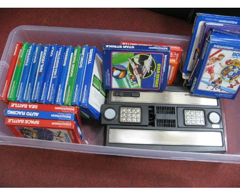 A Mattel Electronics Intellivision Gaming Console, (circa early 1980's) together with twenty two boxed gaming cartridges, inc