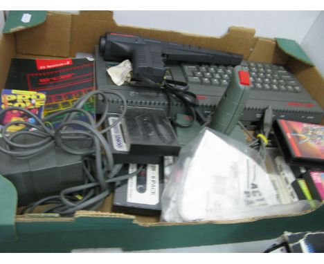 A Sinclair 128K ZX Spectrum + 2 Personal Computer, (circa late 1980's), joystick, action pack pistol, manual, games (cassette