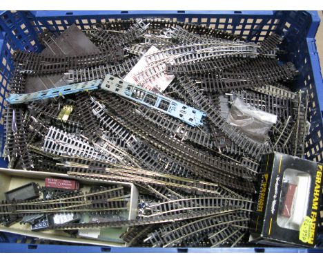 A Large Quantity of Peco 'N' Gauge Track, straights, curves, points etc, plus ten items of 'N' gauge rolling stock by Lima, G