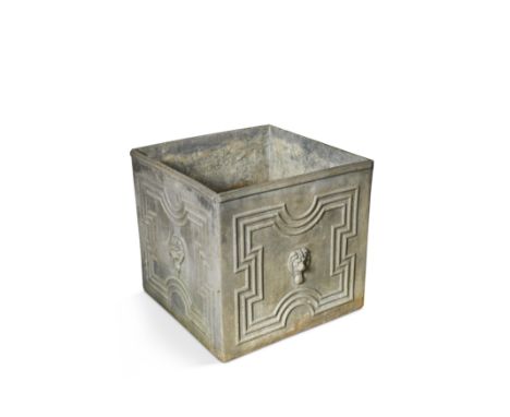 decorated with geometric mouldings surrounding lions' heads 48 x 52 x 52cm together with a small rectangular lead planter 22 