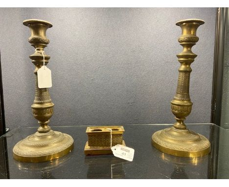 the baluster columns and spreading circular bases with engine turned decoration, together with a similarly decorated inkstand