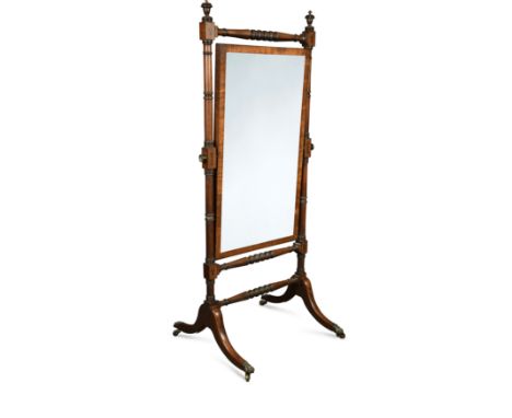 with cross-banded frame, between ring turned column supports raised on reeded splay legs with lion's paw castors 165 x 72 x 6