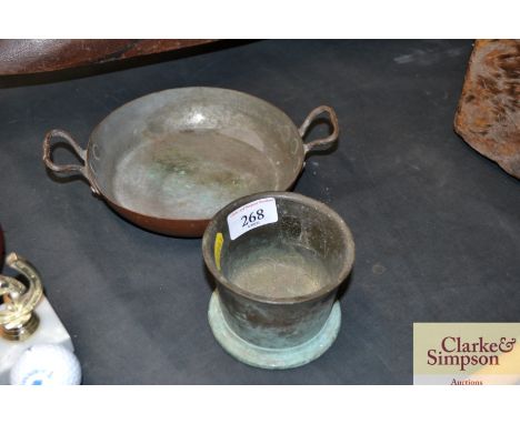 A small bronze mortar and a copper two handled pan