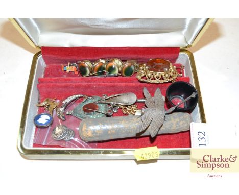 A quantity of various costume jewellery; a small silver mother of pearl handled bookmark in the form of a trowel; a cased Art