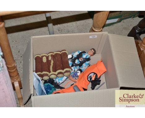 An Action Man and accessories