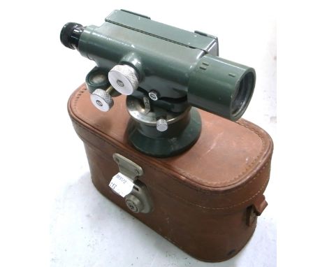A Watts SL-10 "Dumpy" level with original period wooden tripod.