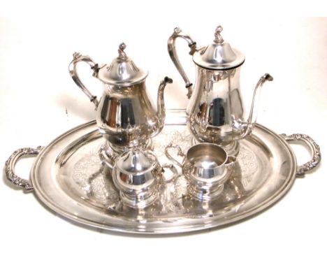 A large oval twin handle engraved silver plated tray and a four piece Oneida tea service to include coffee pot, hot water pot