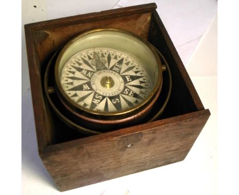 A late 19th early 20th century white Thomson & Co. of Glasgow ships compass.