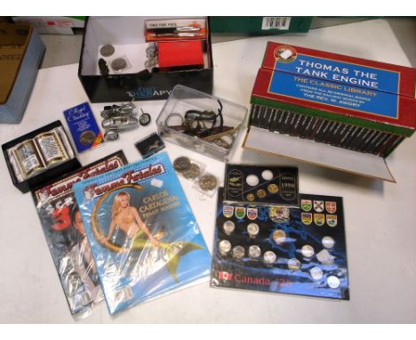 A mixed collectors lot to include 20th century coinage, fashion watches and a boxed set of Thomas the Tank Engine children's 