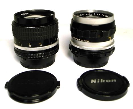A Nikkor f2 85mm AI portrait lens and an f2.8 35mm non AI wide angle lens (2). CONDITION REPORT The 85mm lens, serial no. 296