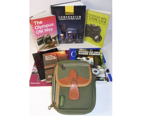 A Billingham camera shoulder bag pouch type bag, several photographic books to include "Collecting Classic Cameras" by Ivor M