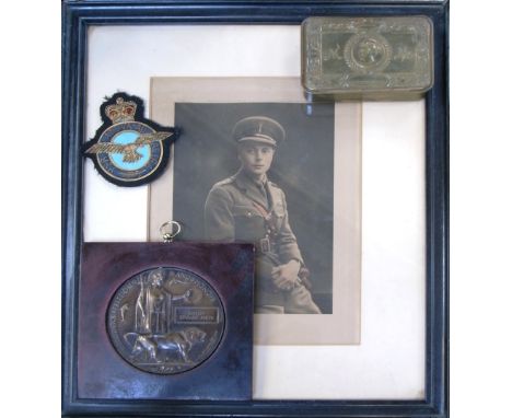 A WWI memorial plaque for Ernest Edward Smith, a military badge, a framed print of Edward Prince of Wales and a WWI Princess 