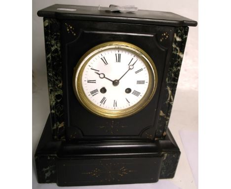 A 19th century French slate eight day striking mantel clock, enamel dial with Roman numerals above a plinth base, height 28cm