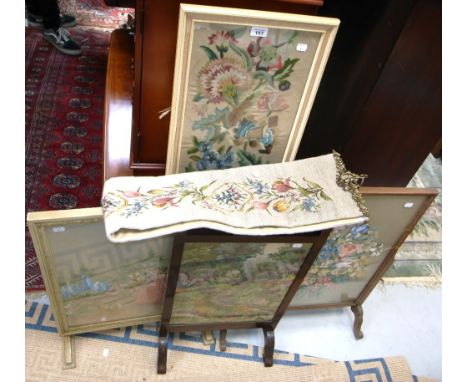 Three various wooden frame free standing tapestry/embroideries, a further framed and glazed example prepared for wall mountin