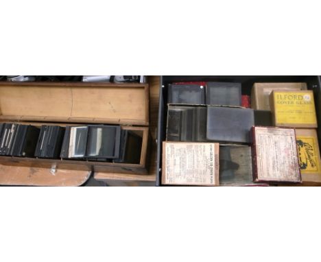 A quantity of late 19th early 20th century lantern slides and a quantity of plate glass negatives.