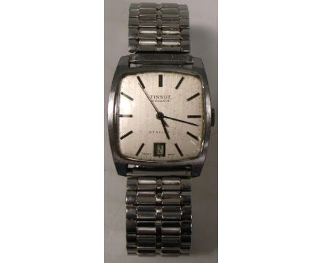 Tissot; a 1960s gentlemans Visodate wristwatch with tonneau stainless steel case, linen dial with baton numerals and date ape