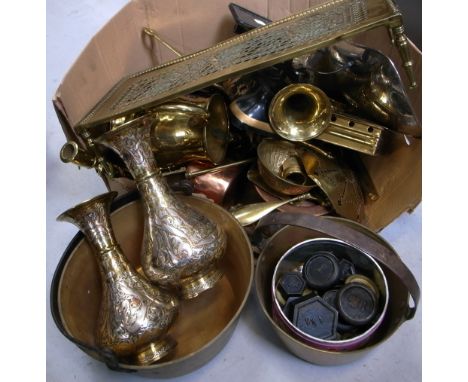 A quantity of brass and copper to include brass pans, a copper kettle, brass candle sticks, brass vases, also a set of scales