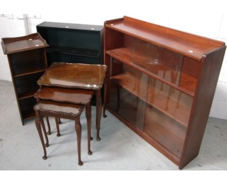 A nest of walnut tables with glass tops, a small shelf unit, a glazed bookcase and one other bookcase (4).