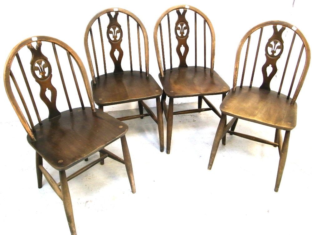 A Set Of Four Ercol Dining Chairs In Fleur De Lys Quot Lot 112 A Set Of Four Ercol Dining Chairs In Fleur De