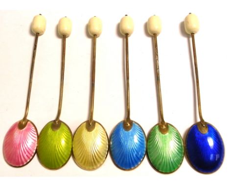 A cased set of six George VI hallmarked silver and enamel coffee bean finial teaspoons, Birmingham 1949.